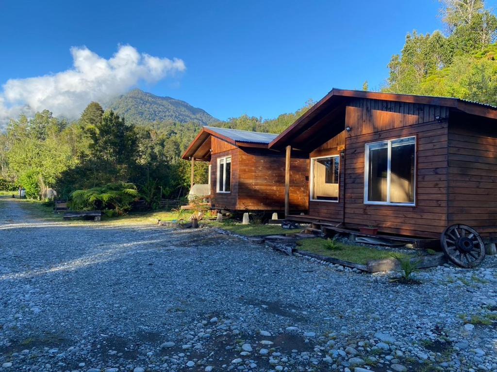 Cabanas & Tinajas Entre Volcanes Hornopirén Exterior foto