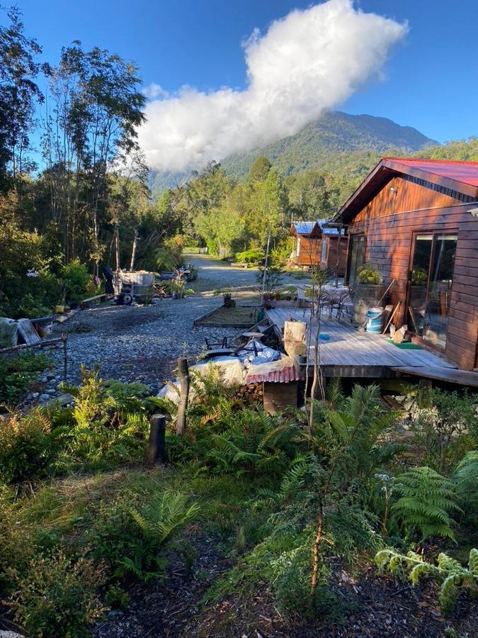 Cabanas & Tinajas Entre Volcanes Hornopirén Exterior foto